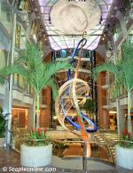 ID 2883 EXPLORER OF THE SEAS (2000/137308grt/IMO 9161728) - The area at the top of the Centrum stairs showing three decks of inward-facing suite windows above.